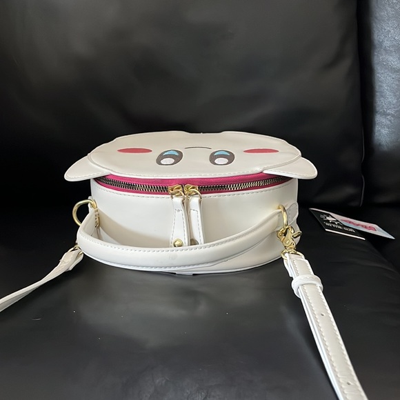 Kirby bag that color changes in the sun. Shoulder bag and backpack. - Picture 3 of 4